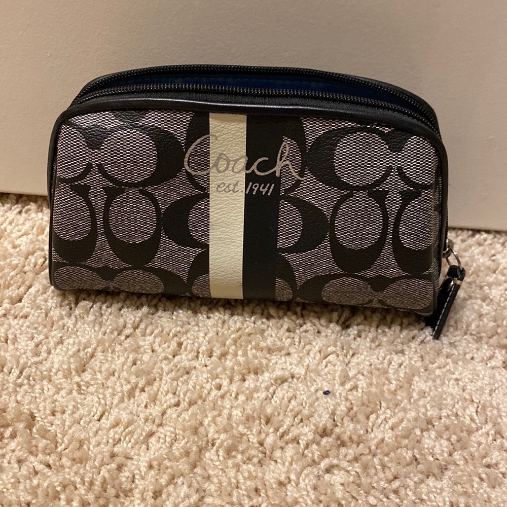 Coach pouch case. 1941. Great for makeup. Lightly used. In great condition.
